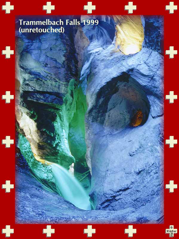 Trammelbach Falls in the Lauterbrunnen valley, 1999. Falls are inside a mountain and are illuminated with colored lights. Unretouched photo using 16mm lens and 1/8 second exposure.