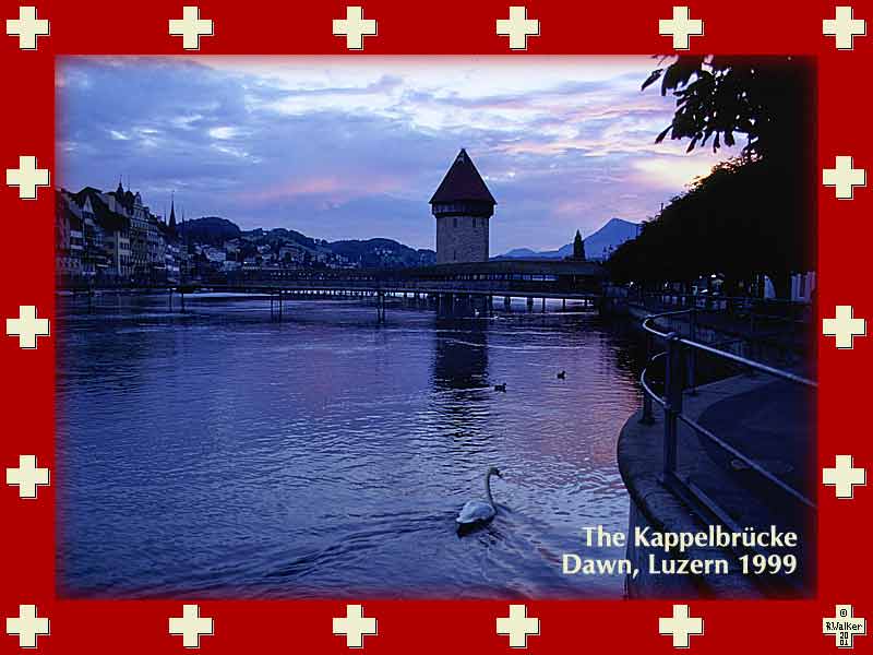 Dawn behind Luzern's Kappelbrücke Bridge, the city's symbol. The bridge burned down in 1992 due to careless smoking and has since been rebuilt Actually, most old towns in Switzerland and the rest of Europe have burned down at least once, so this carries on the tradition.